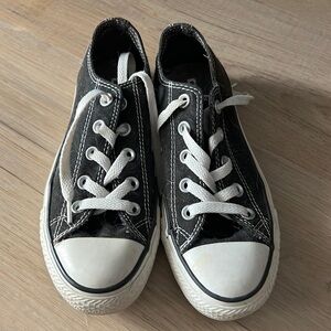 Very gently wearing converse